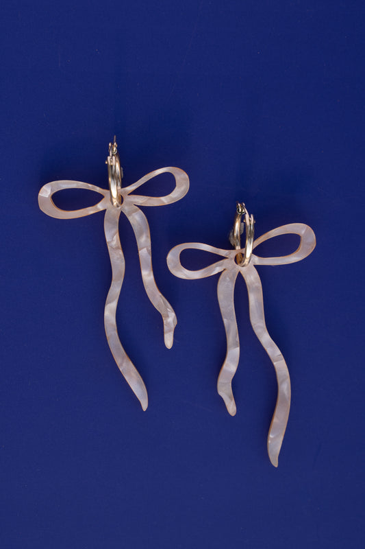 Pearlescent Beige Dangly Bow Hoop Earrings