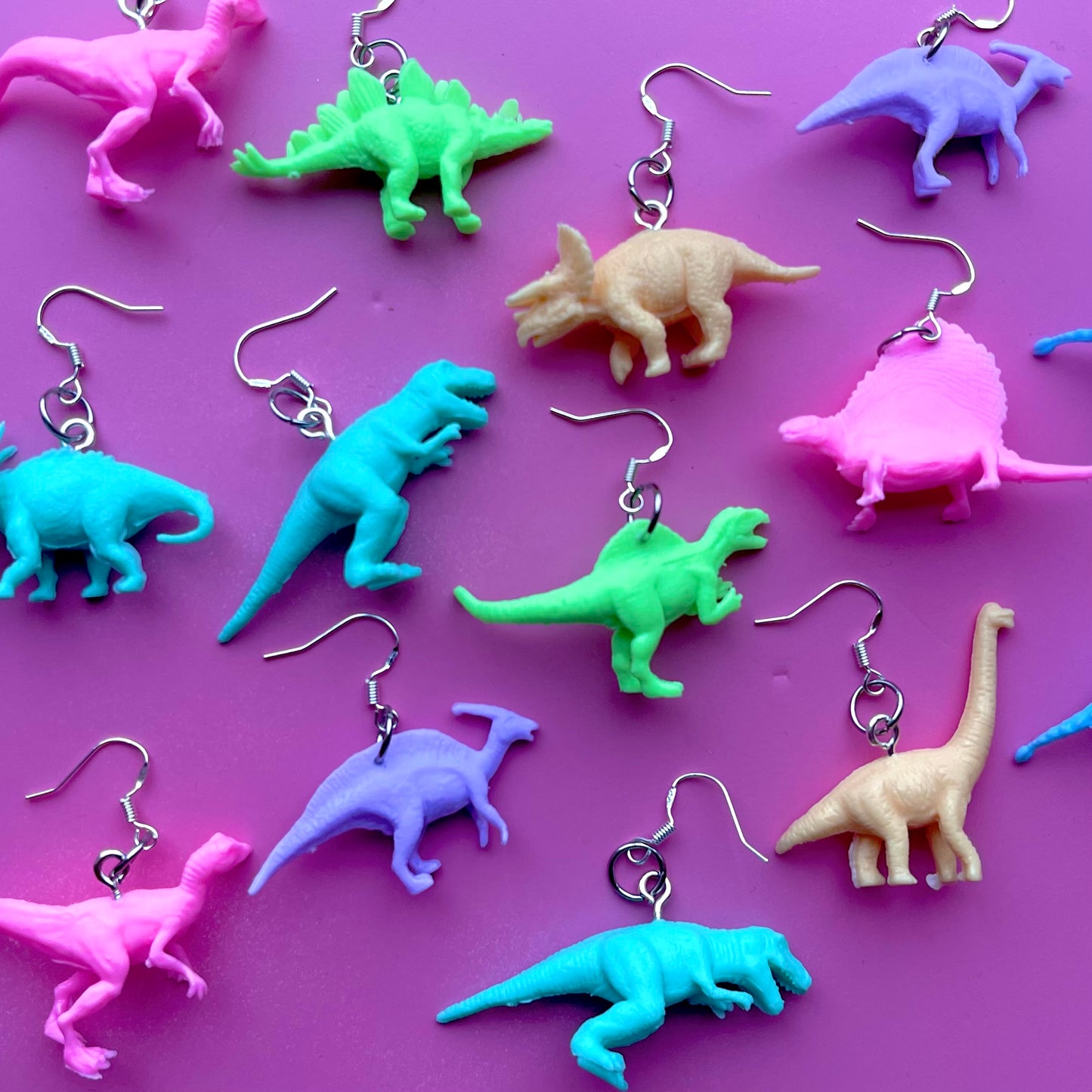 Pendientes de dinosaurio